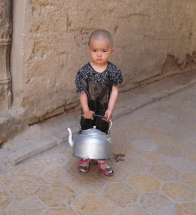 Kashgar Child with teapot Bev Dunbar The Gilded Image
